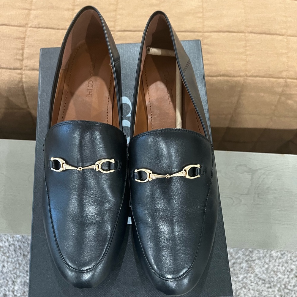 Coach women’s loafers, size 11.